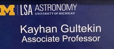 Office nameplate that says "Kayhan Gultekin, Associate Professor"